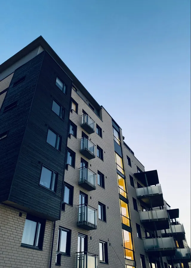 Contemporary residential building with glass balconies